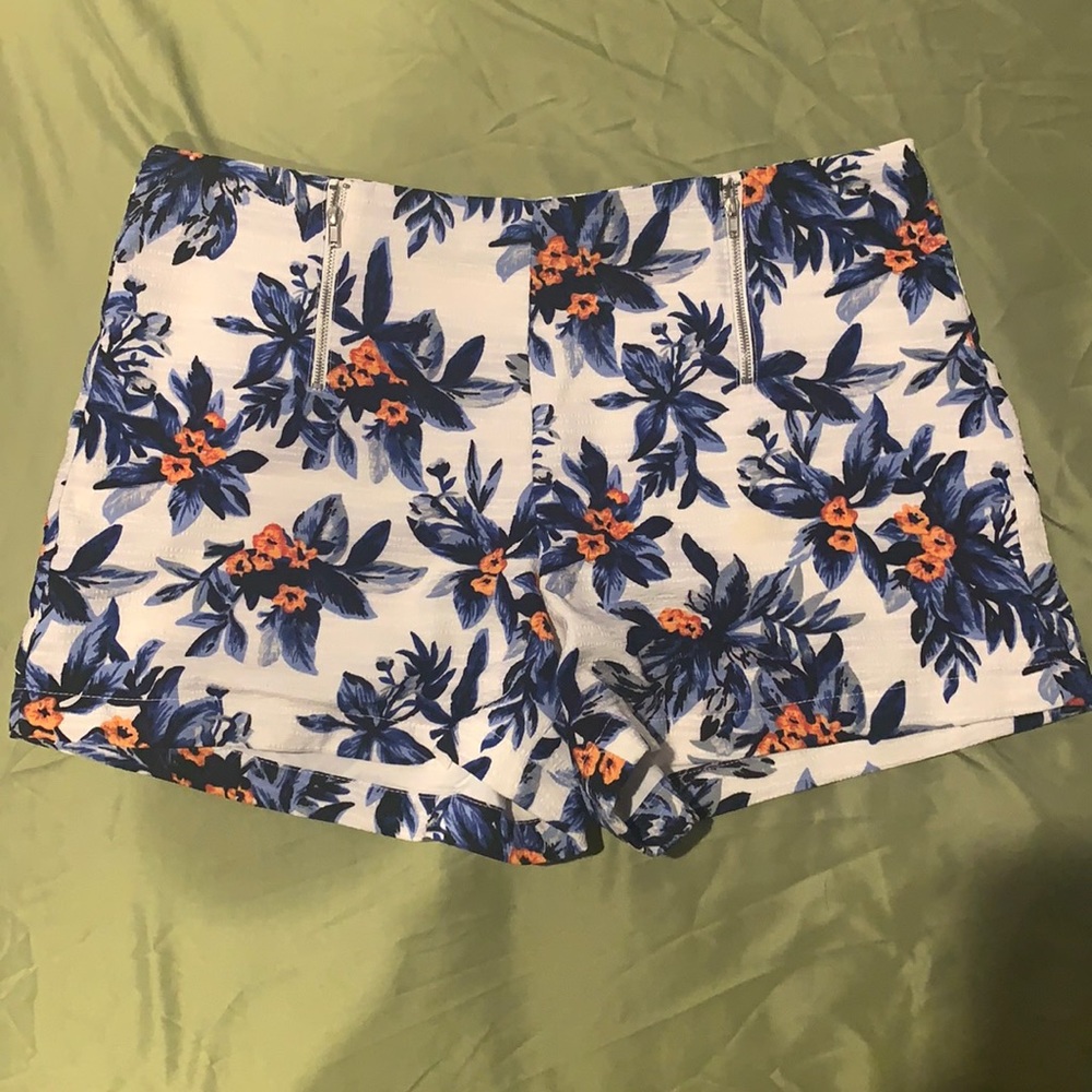 Blue and orange floral shorts with back zipper and front zipper detailing
